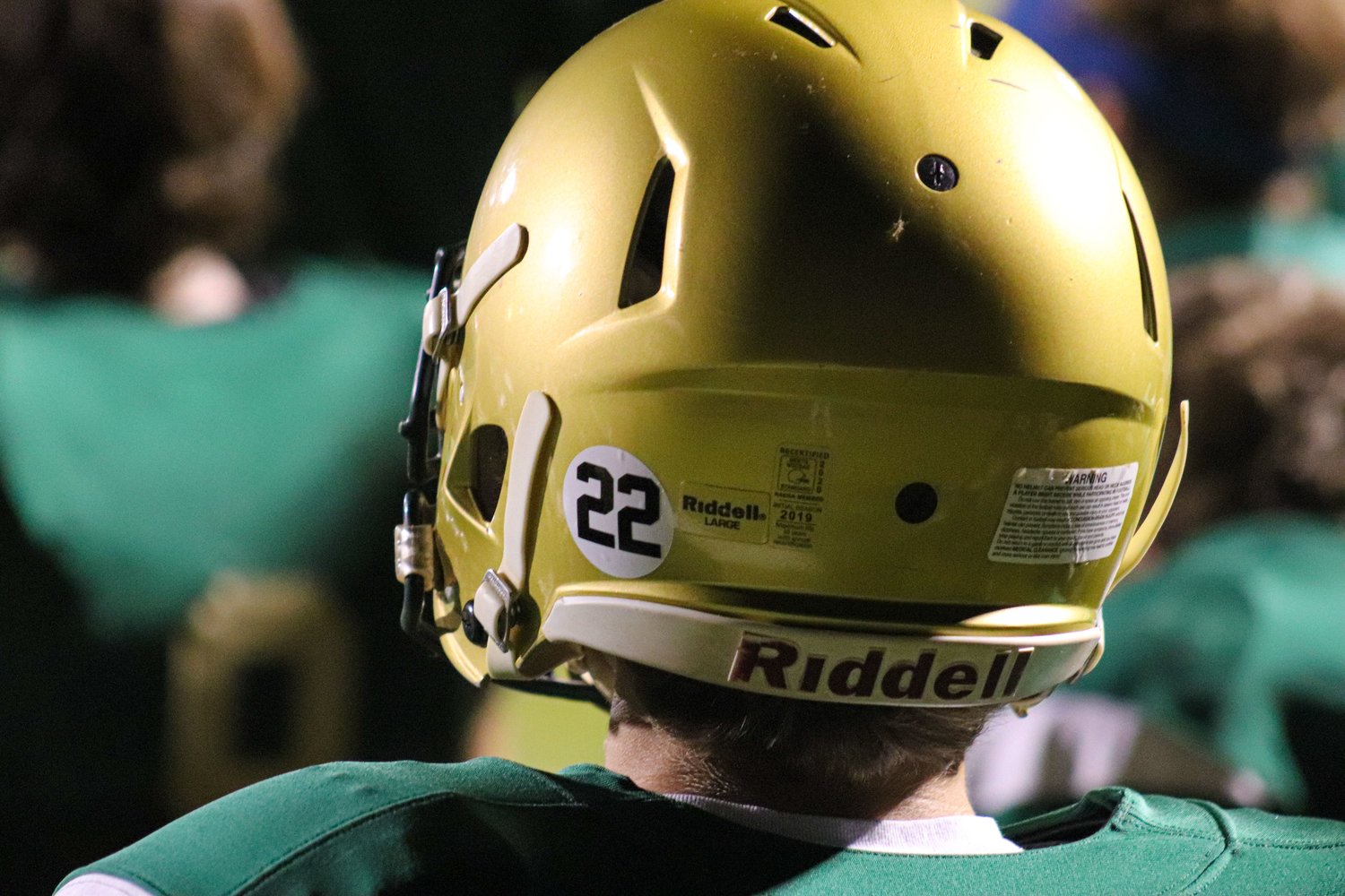 Northwood sported the number 22 on their helmets in their first-round playoff game against West Carteret on Friday in support of their teammate, sophomore Troy Ennis, who was diagnosed with Ewing's sarcoma on April 9. Chargers' head coach Cullen Homolka said he's 'like a son to me.'